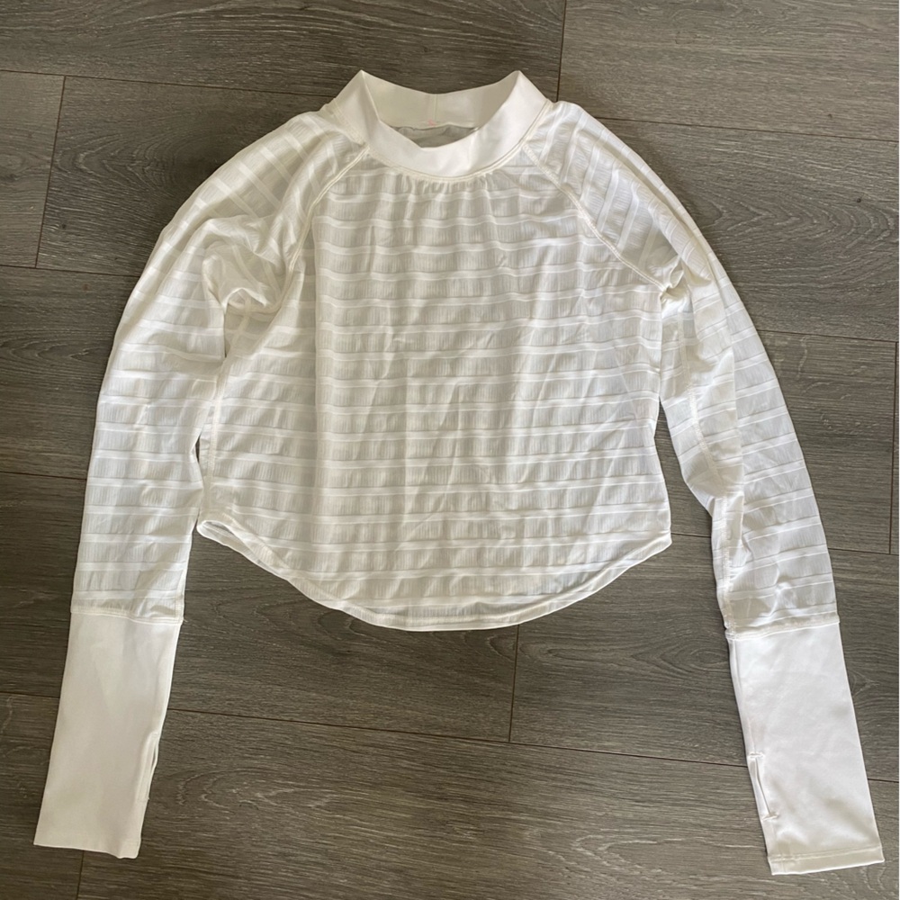 Free People Movement Sheer white panel top.